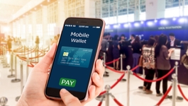 Hand holding a phone that says Mobile Wallet